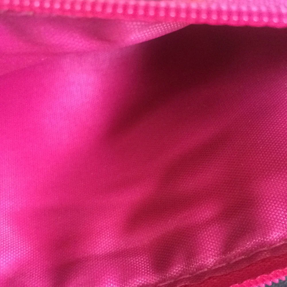 Striped cosmetic pouch